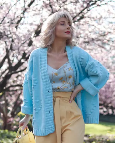 Woman in spring fashion with cherry blossoms